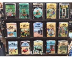 TINTIN gros lot de briquet de collection complète 24 Briquets à essence en métal