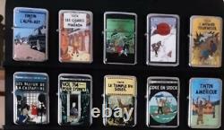 TINTIN gros lot de briquet de collection complète 24 Briquets à essence en métal